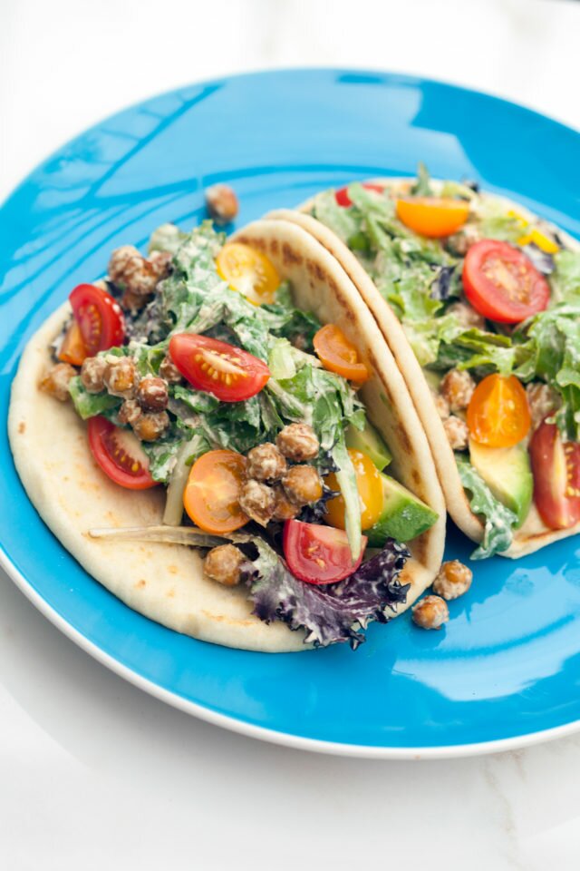 A crazy tasty #vegan caesar dressing, crunchy spiced chickpeas, creamy avocado, and sweet tomatoes make for an incredible lunch option! | www.spachethespatula.com #recipe