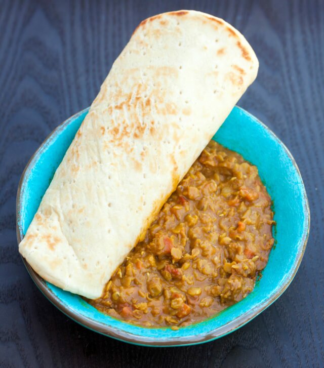 A super easy, and super tasty curried lentil dish that pairs perfectly with everything from mashed potatoes to flatbread | www.spachethespatula.com #recipe #vegan